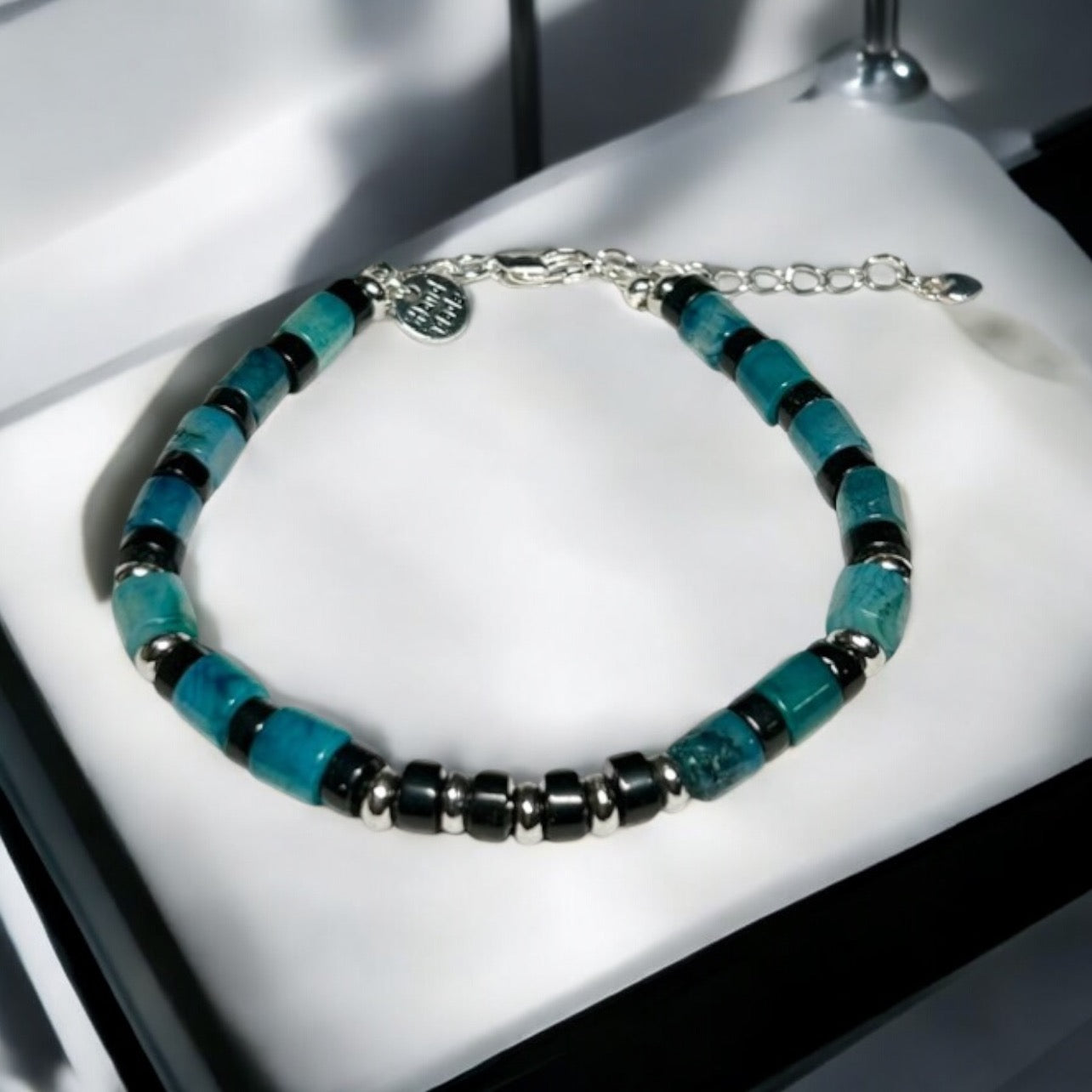 Cylindrical Apatite and Onyx Gemstones